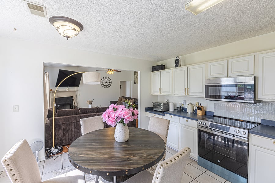 Fully equipped kitchen with modern appliances, cookware, and everything you need for a home-cooked meal.