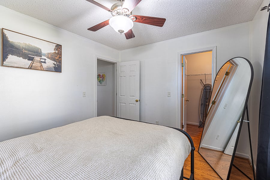 Queen bed, closet, and relaxing decor