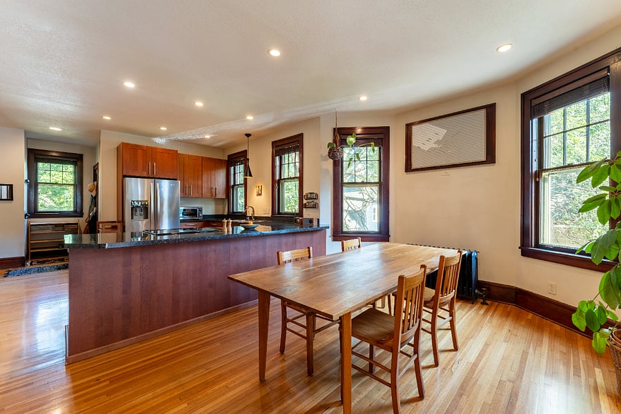 Sunny, south-facing upper level of duplex. Dinning table can easily seat 8.