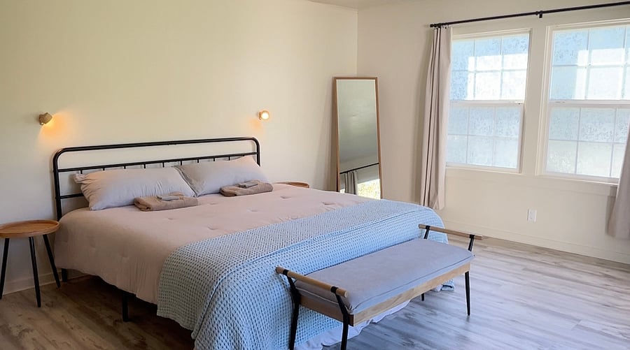 Visible in this picture are the two reading lights mounted above the bed.