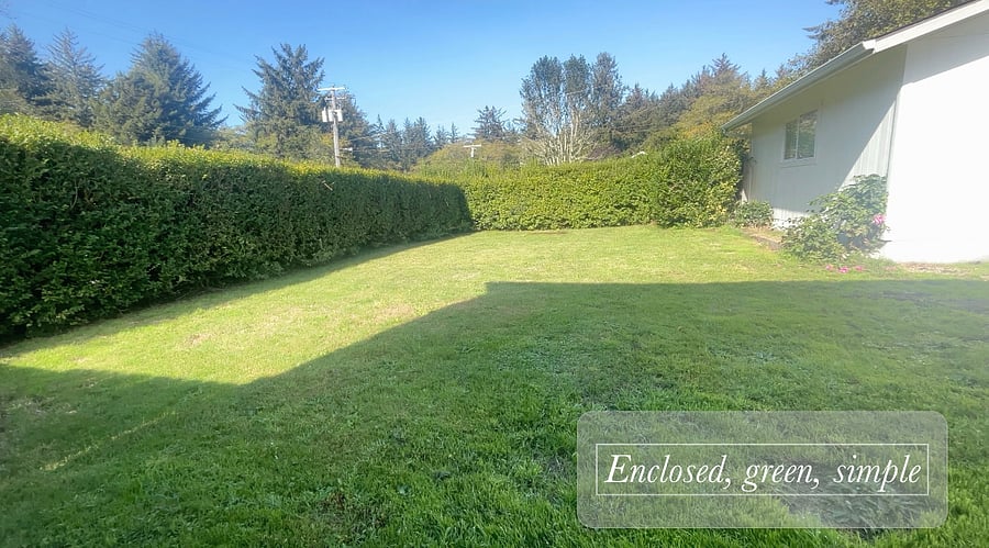 The backyard is enclosed and both bedrooms have their own direct entrance to it.