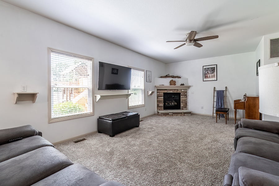 Fireplace and piano in living room