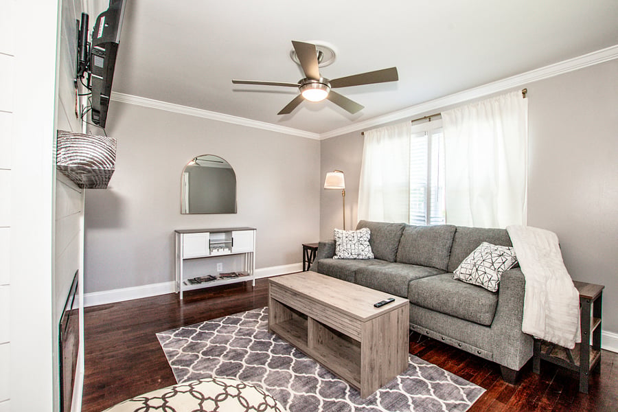 Table pulls out- very convenient for at home laptop work.