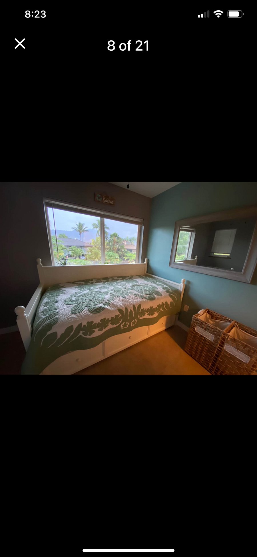 Fourth bedroom with twin bed and laundry