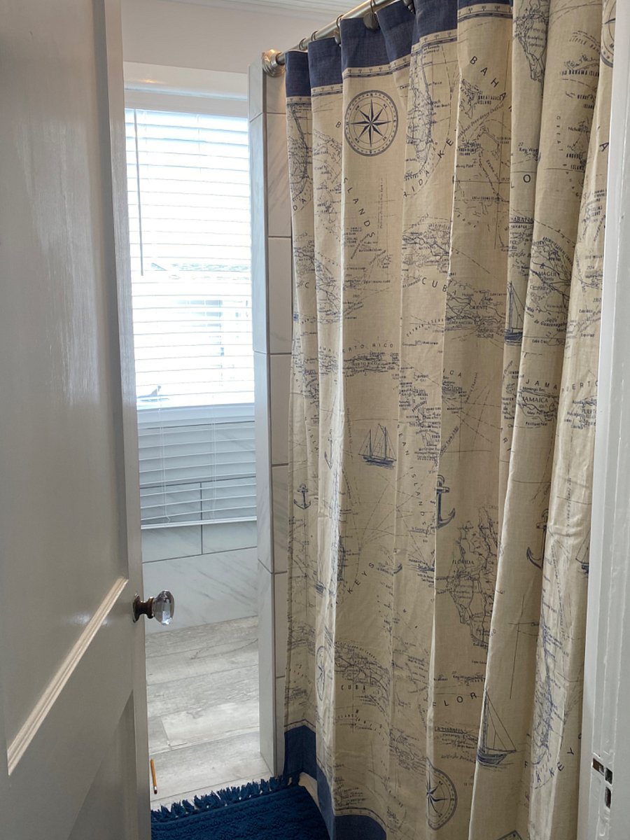 Full bath on second floor accessible from hallway.