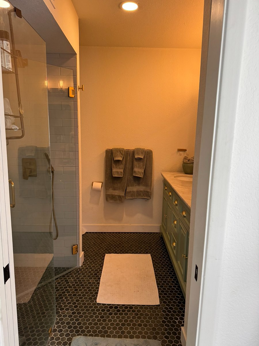 Primary master bath with rain shower. 