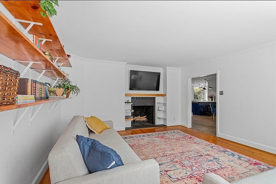 Living room with smart tv ready for you to sign in to watch a game, show or movie.  