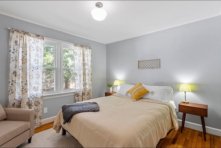 Second hall bedroom with queen bed, nice light and closet