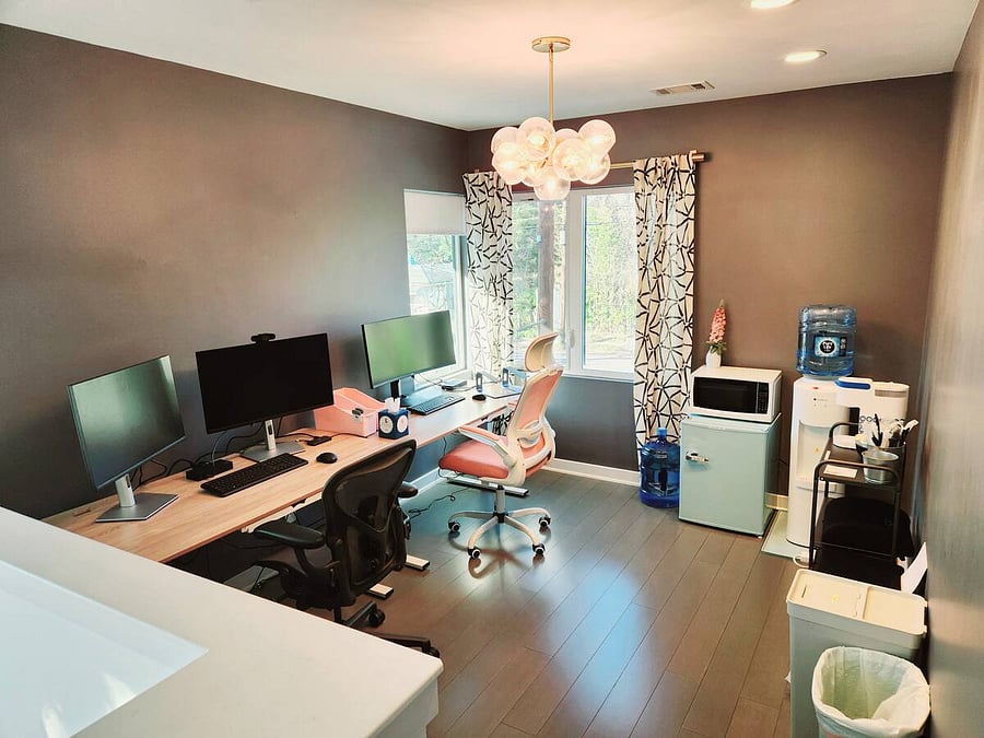 2 Electric sit/stand desks; 1 Herman Miller office chair; 1 Double monitor setup and 1 Dell 34 Inch Gaming monitor; two Lenovo Thinkpad power stations, two keyboard/mouse setup; printer, water cooler; Keurig, fridge & microwave