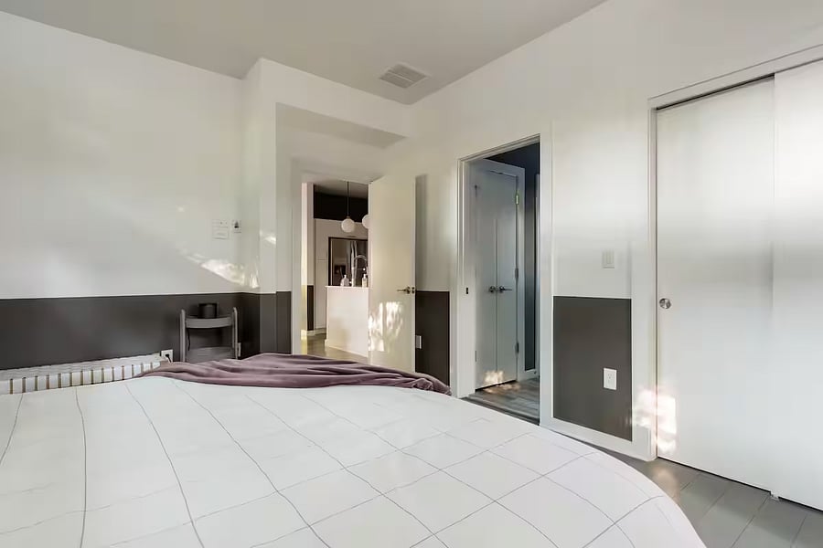 Bedroom 1 | master bedroom (first floor): opens into the living space, has its own ensuite bathroom
