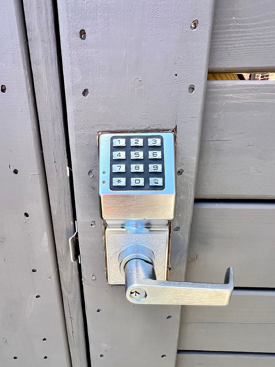We've taken security seriously. This is the high-end, programmable lock on the gate to the patio. There is a second lock on the door from the patio into the kitchen. Finally, we have a camera focused on this gate that records 24/7.