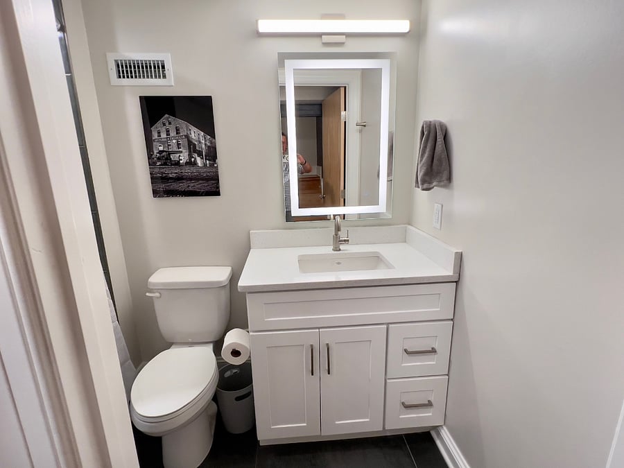 Beautiful and well-lit secondary bathroom. 