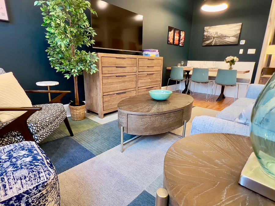 Comfortable and inviting living area looking towards dining table.