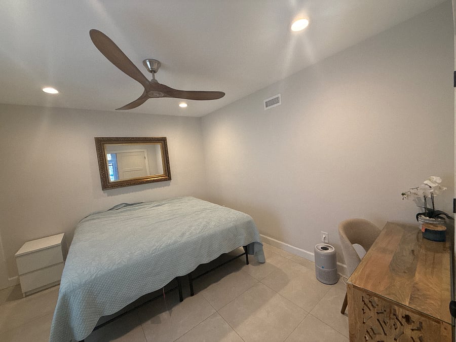 Large bedroom set away from the other living quarters, recessed lights, wood ceiling fan, ample storage, and large closet.
