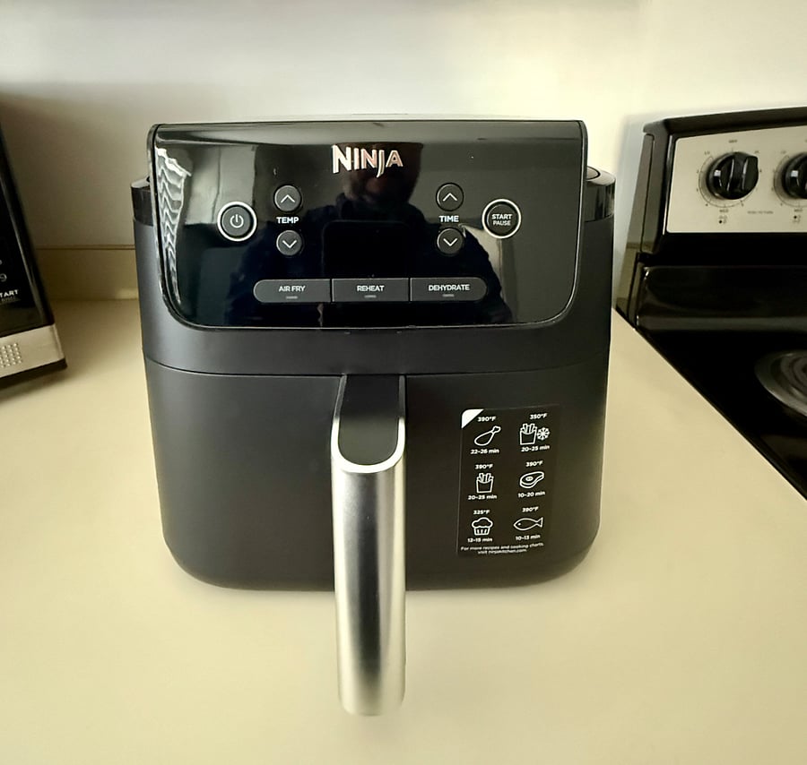 Ninja Air Fryer Pro 4-in-1 Air Fryer, a fast and easy way to get the perfect crisp with up to 400F of heat. Air Crisp Technology surrounds your favorite foods with superheated air for hot, crispy results. 5 QT capacity fits up to 4 lbs. of fries and 4 cooking functions lets you satisfy any craving, from crispy snacks to full meals. Cleanup is a breeze with a nonstick basket and crisper plate.