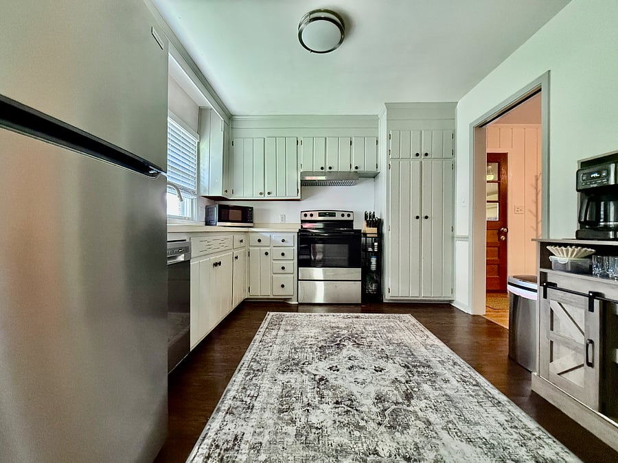 All new appliances in 2024 Featuring full-size refrigerator, electric stove/oven, 18" dishwasher, garbage disposal, double-sink, full size microwave, coffee maker, toaster, slow cooker, air fryer, full set of pots, pans, dishes, flatware, kitchen utensils, and more.
