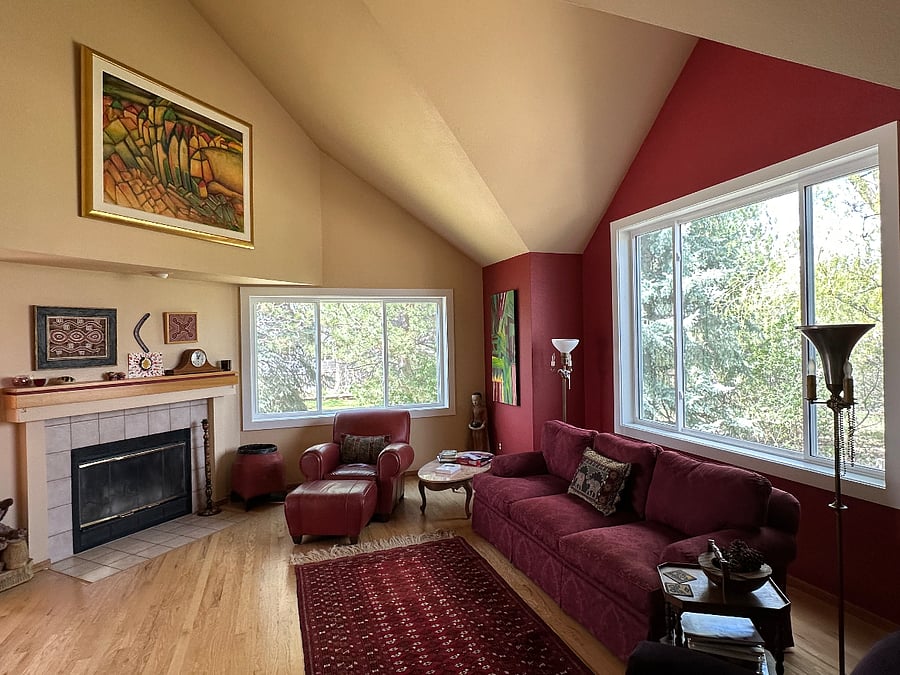 Living room area with lots of natural light 
