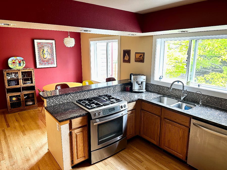 Kitchen with bar and eating area