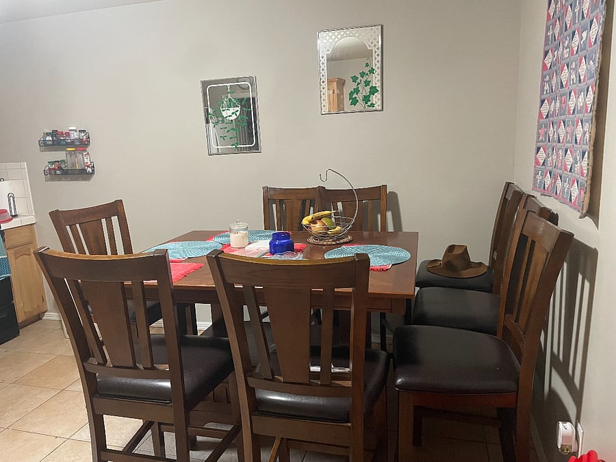 Large kitchen table seats 8 people. Can be used for additional counter space when cooking.