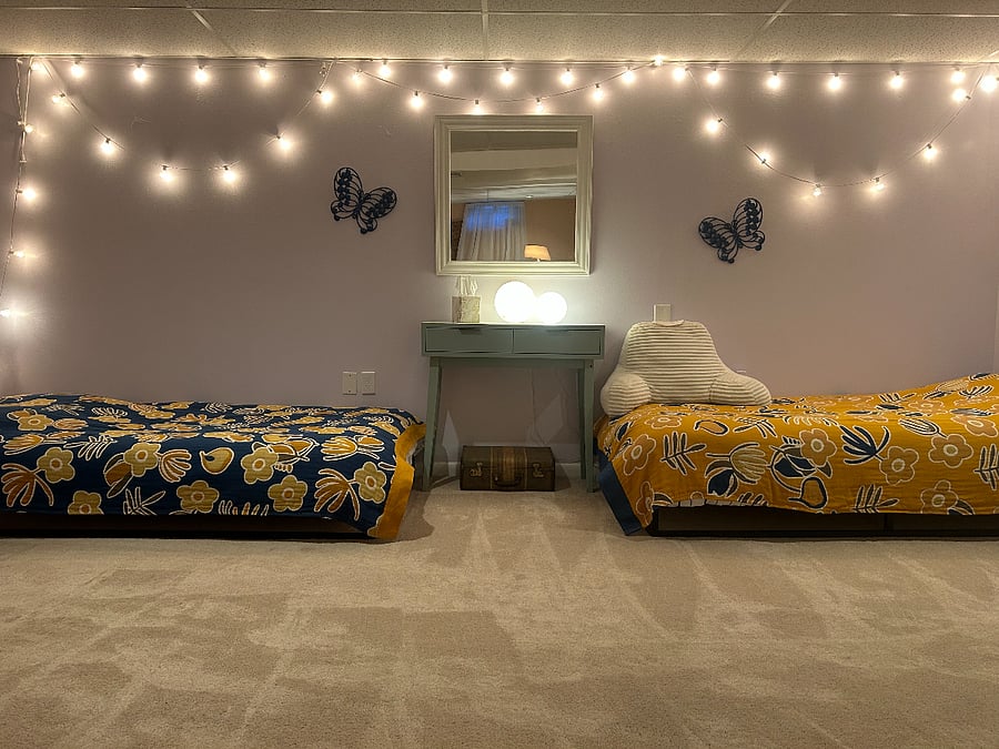 There are two twin beds in the main space for extra seating or overnight visitors. These can be removed if you need space for your things.