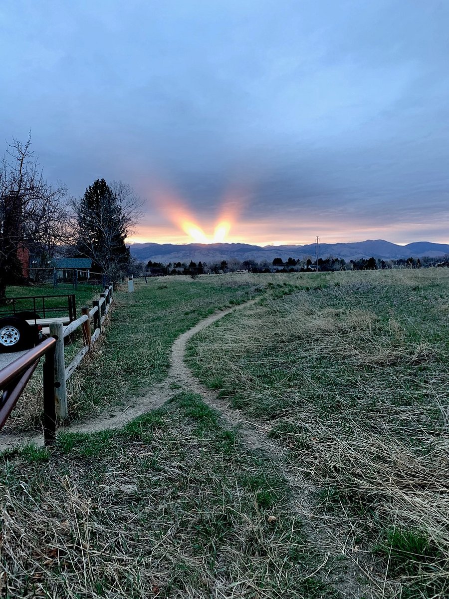 Open space trails with sweeping views surround the neighborhood.