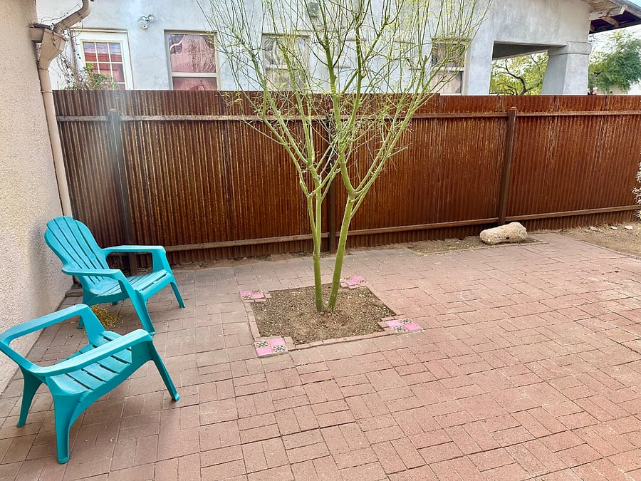 Sitting area inside Fully Fenced Backyard