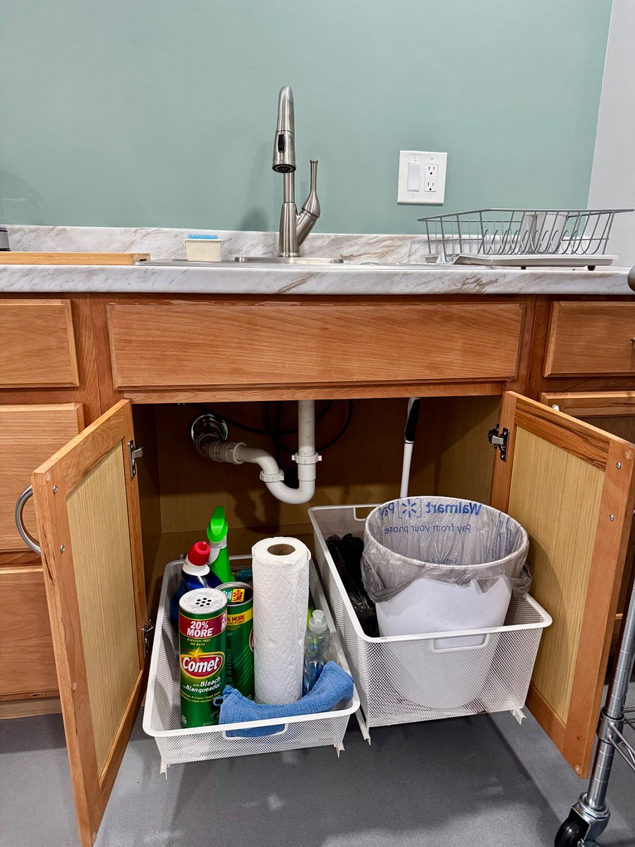 Under sink pull outs for trash and cleaning supplies