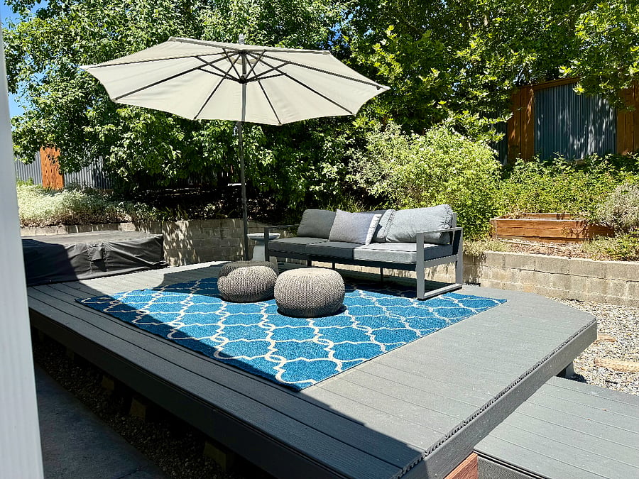 Patio in Back Yard Attached to Hot Tub
