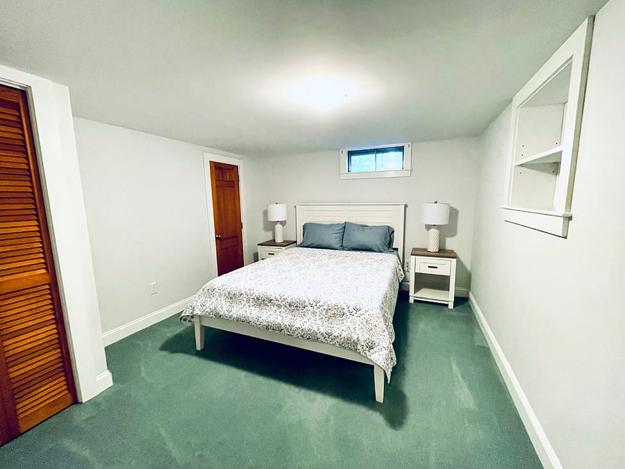 3rd bedroom downstairs with queen bed