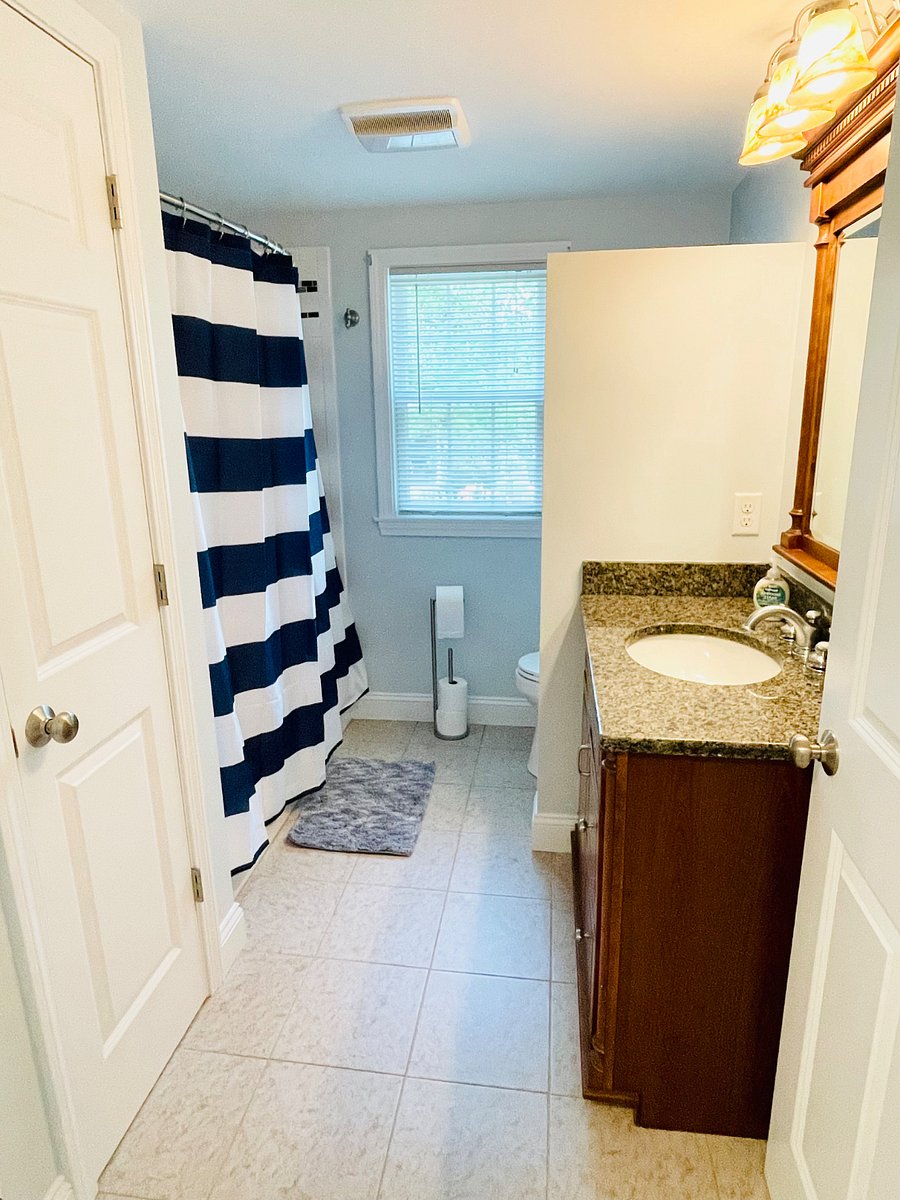 2nd full bathroom with shower and tub and linen closet