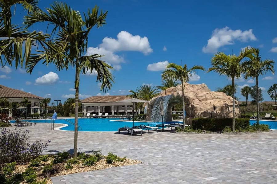 There are multiple pools for use in the community. This is the resort style pool with waterfall, hot tub, and tiki bar!