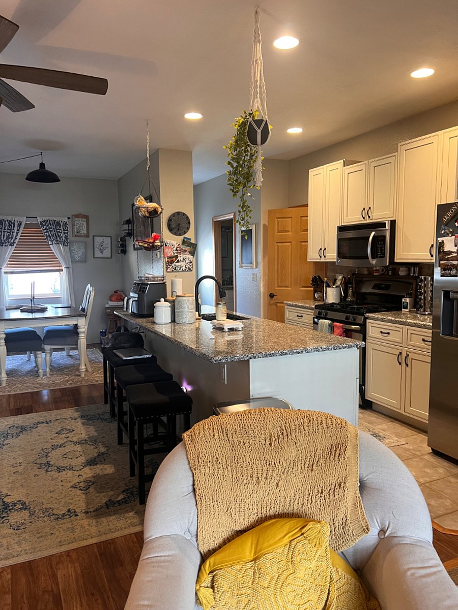Back entrance/kitchen and door that leads down to the basement 