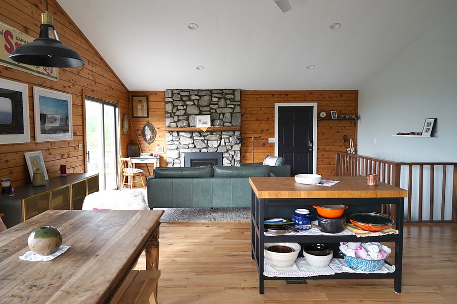 The kitchen looking towards the sitting area in the great room with gas fireplace.