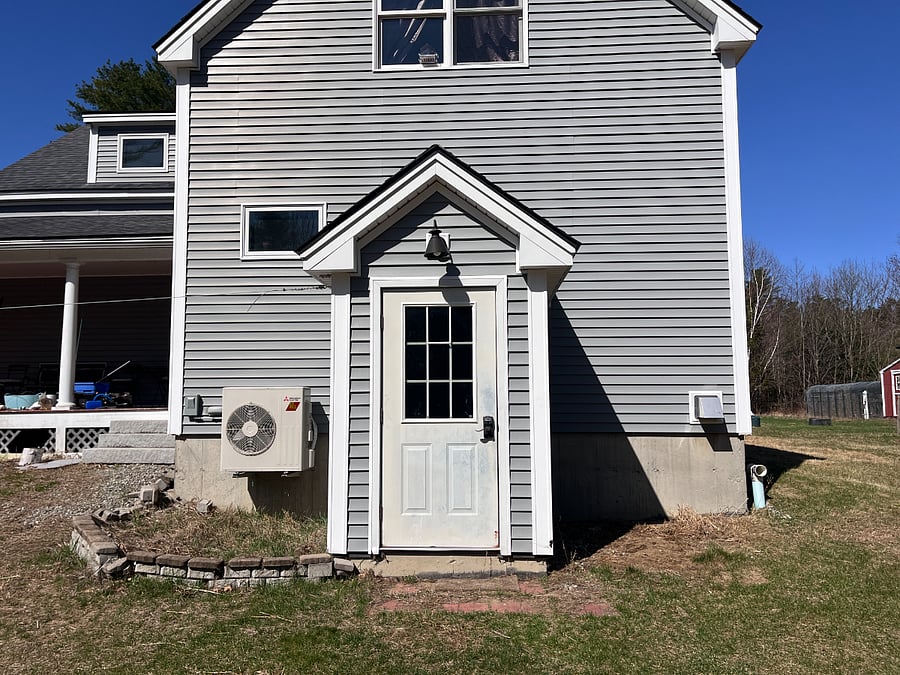 exterior entry - on opposite side of house from the driveway / parking. Walk around to the right and can enter the rear of the garage