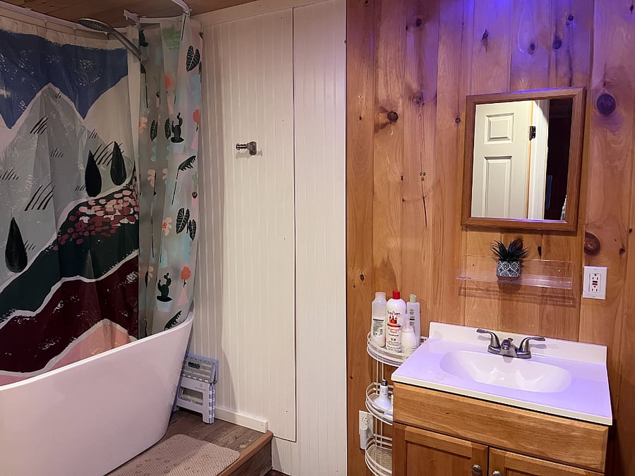 Soaker tub with shower head