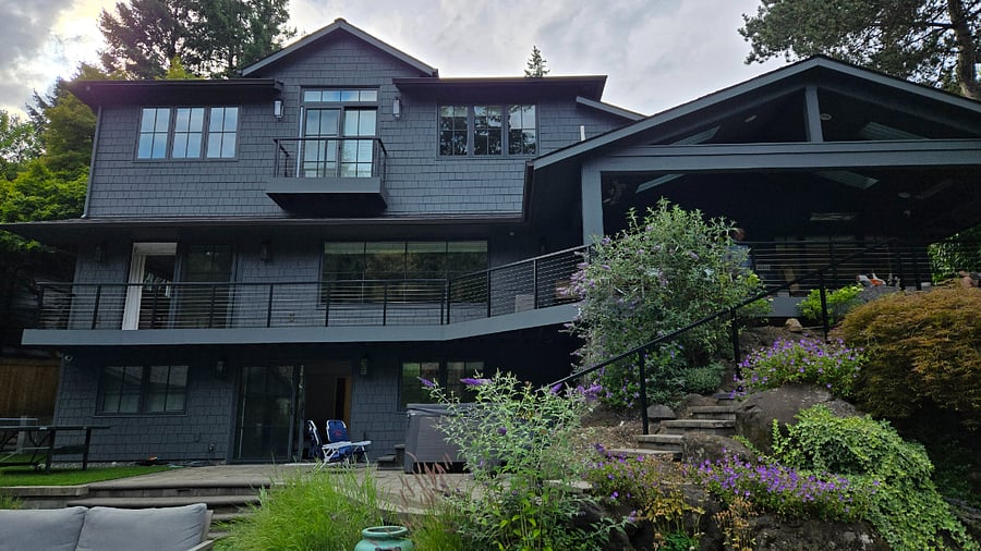 Back of the house. You'll live on the lower floor.