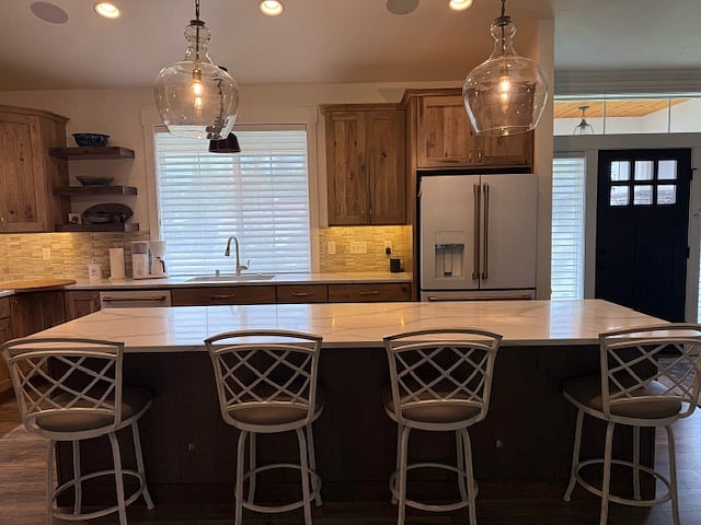 Kitchen with island seating.