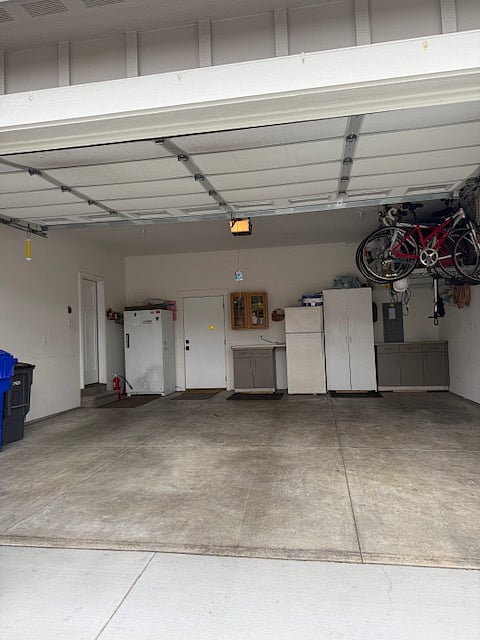 2-Car Garage with easy access to interior of house and back yard. 