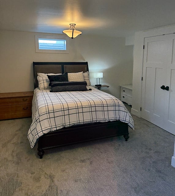 Large downstairs bedroom with queen size bed.