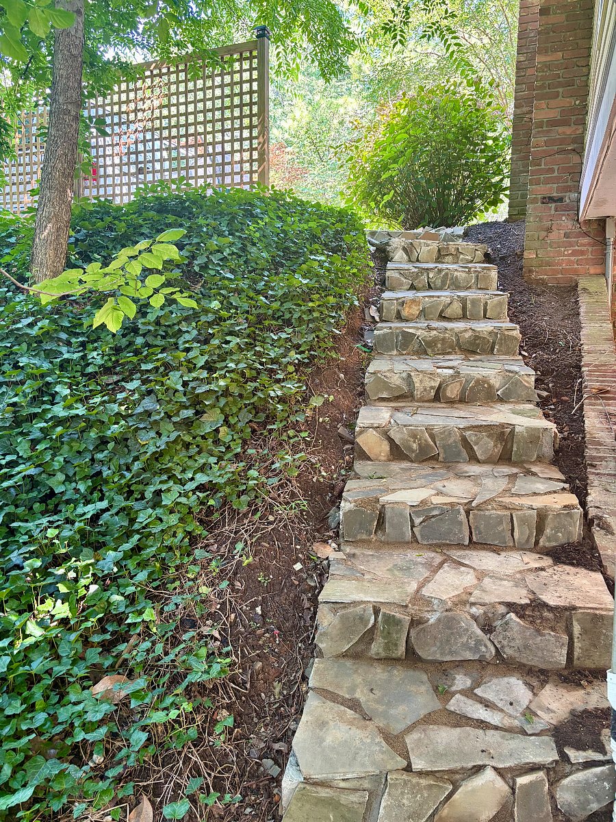 Stairs up and down from the parking spot in driveway 