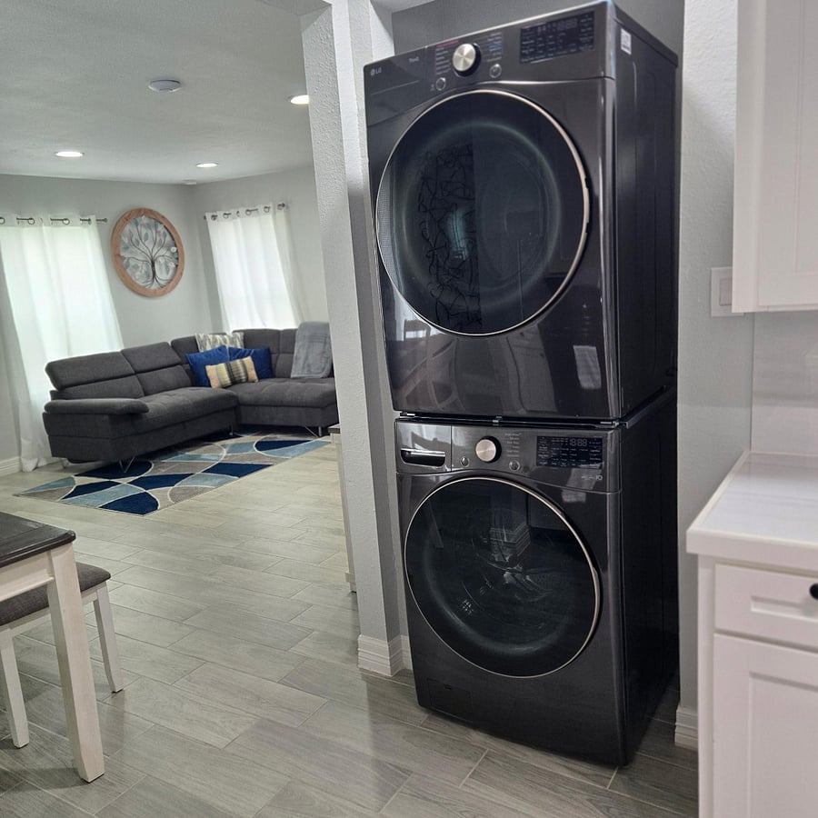 Functional design meets practicality: laundry right off the heart of the home.