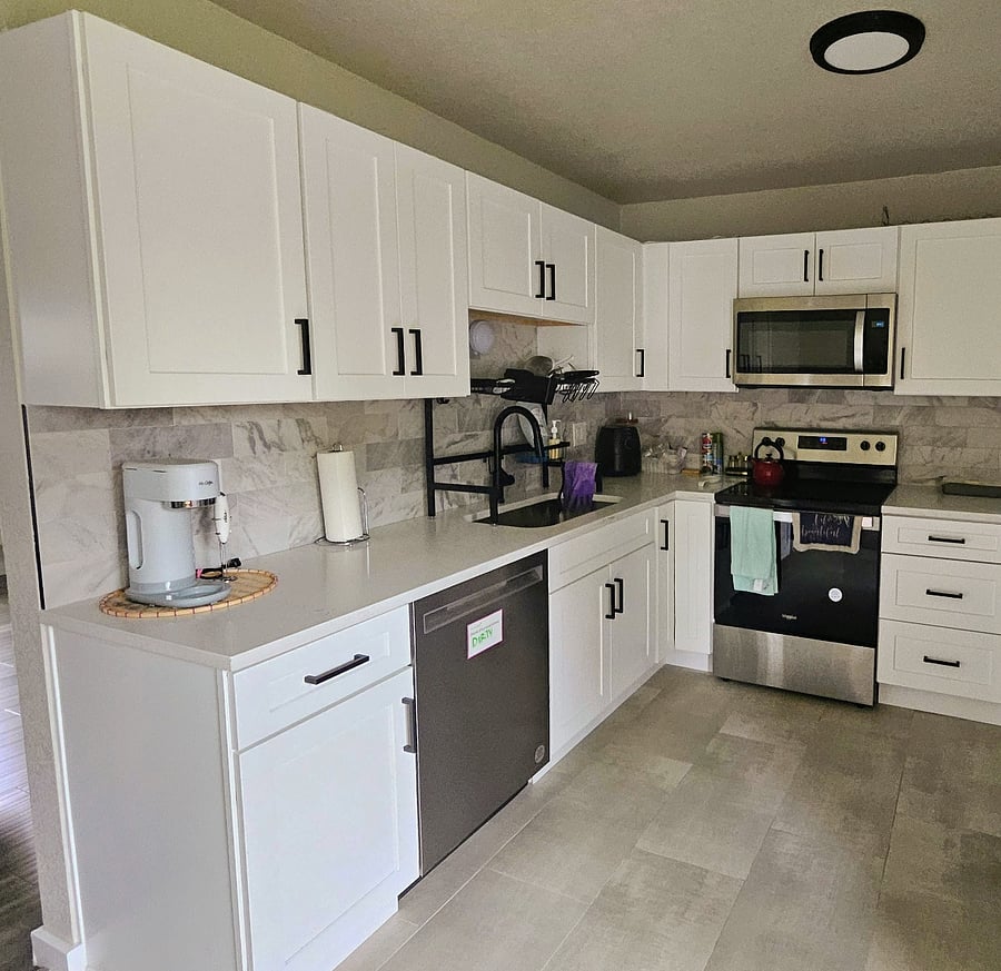 Kitchen with brand new appliances and cabinets 