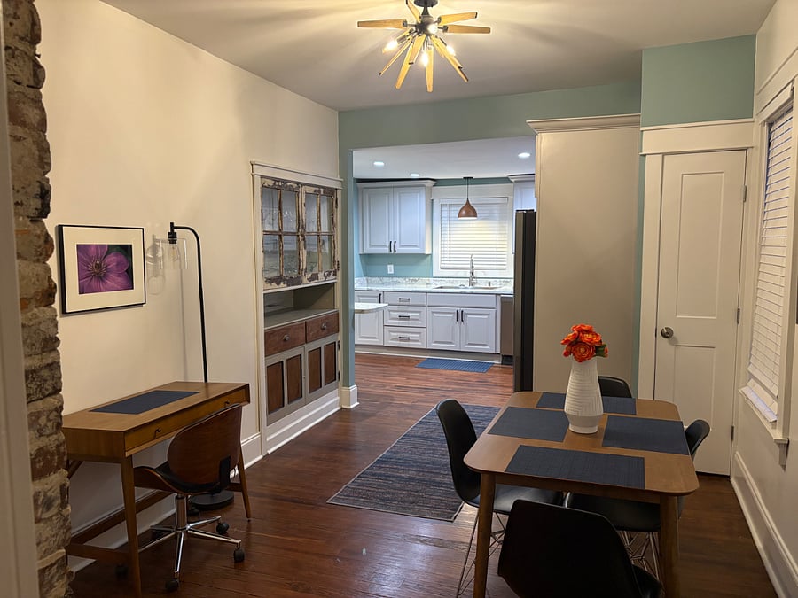Dining room/office/kitchen located off living room.