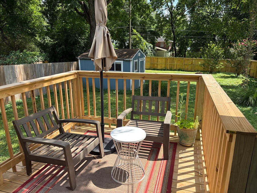 Deck area with fenced in yard.