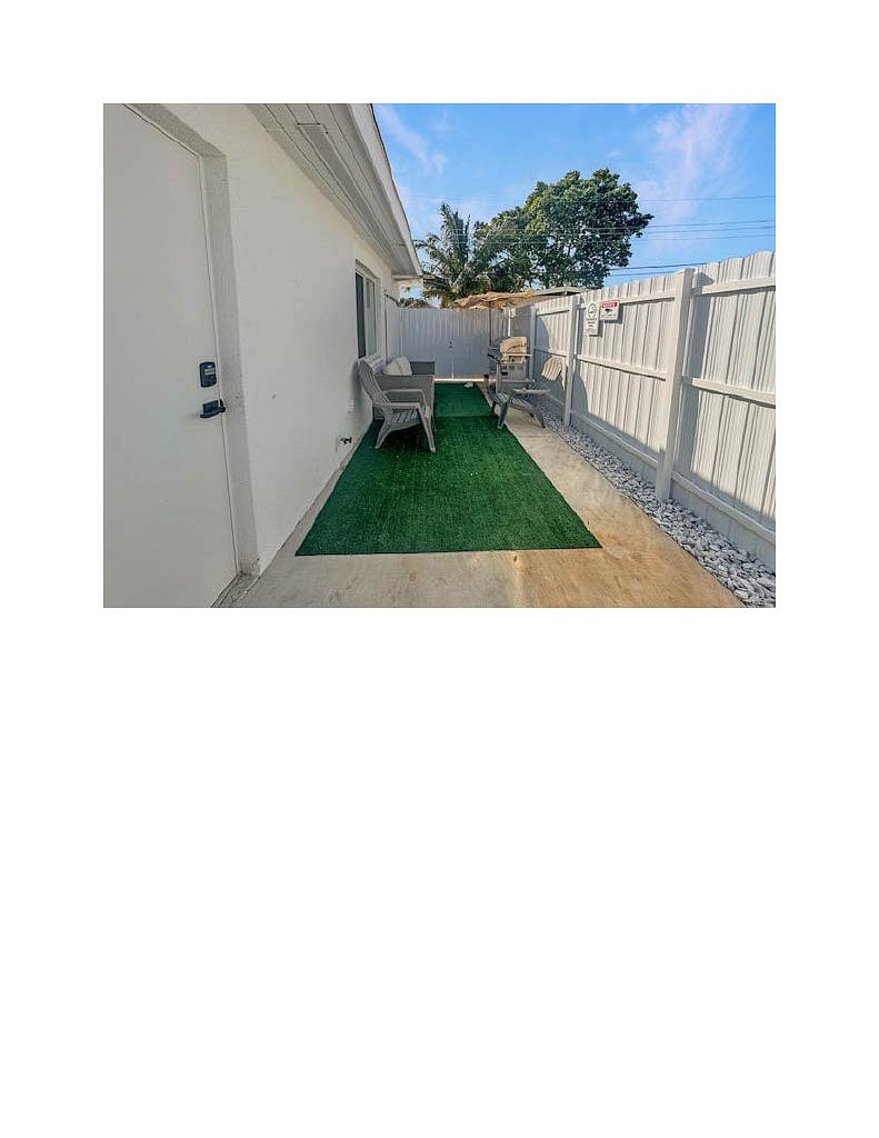 larger outside barbeque/ sitting area