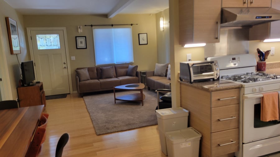 Kitchen with view of Living room and Front door