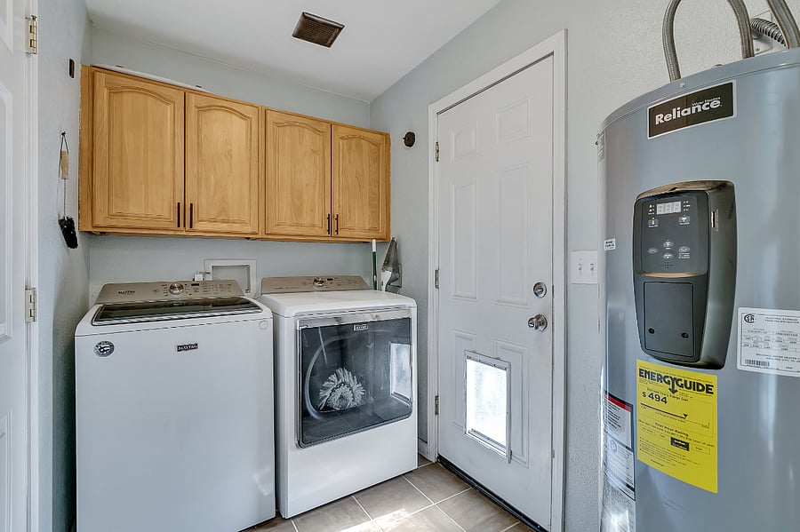 Laundry off kitchen. 