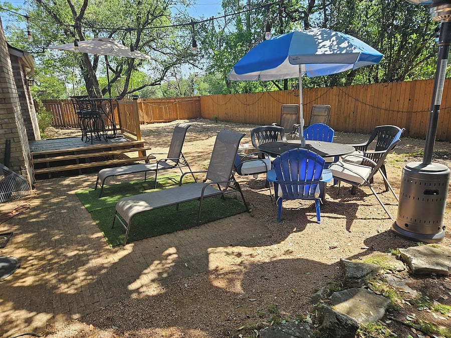 Backyard with deck, walking ramp, outdoor lights, firepit and firetower