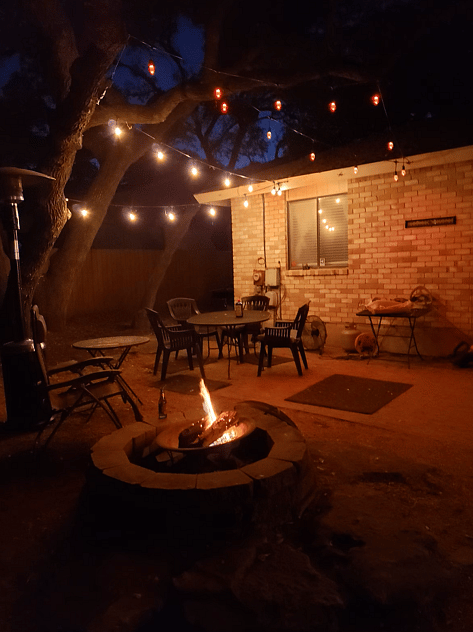 Backyard with deck, walking ramp, outdoor lights, firepit and firetower