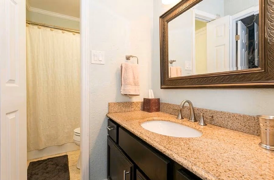 Master Bathroom with tub and walk in closet